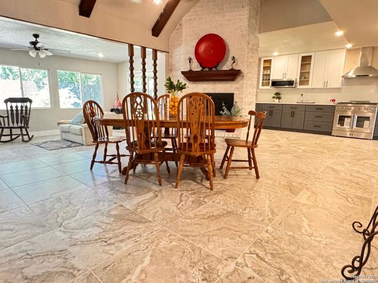 Dining room, Fireplace, Interior, Kitchen, Recessed Lighting, Stainless Steel Appliances, Stone Walls, Wooden Beams