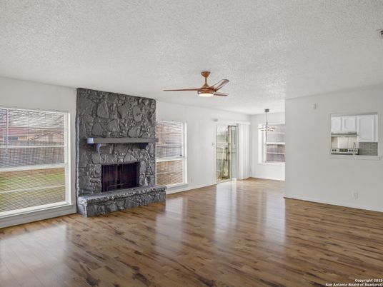 Empty room, Fireplace, Interior, Pendant Lights, Wood Texture Flooring