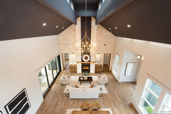 Fireplace, Interior, Living room, Pendant Lights, Recessed Lighting, Stone Walls, Wood Texture Flooring