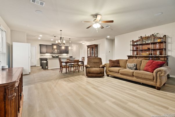 Dining room, Interior, Kitchen, Living room, Pendant Lights, Recessed Lighting, Stainless Steel Appliances, Wood Texture Flooring