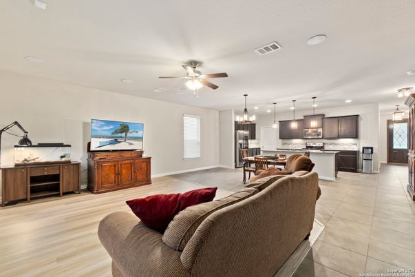 Dining room, Interior, Kitchen, Living room, Pendant Lights, Recessed Lighting, Stainless Steel Appliances, Wood Texture Flooring