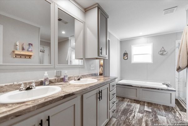 Bathroom, Dual Sink Vanities, Interior, Recessed Lighting, Wood Texture Flooring