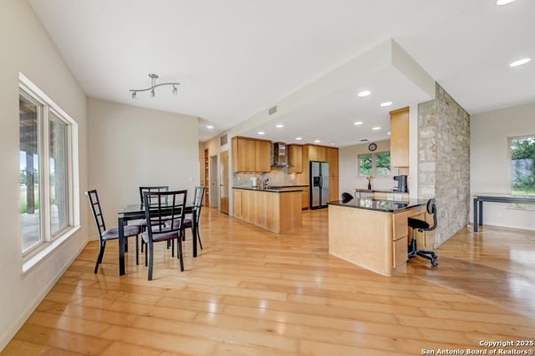 Dining room, Interior, Kitchen, Recessed Lighting, Stainless Steel Appliances, Wood Texture Flooring