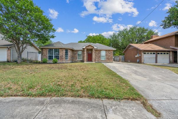 Attached, Backyard, Detached Garage, Exterior, Facade, Brick Facade, Ranch