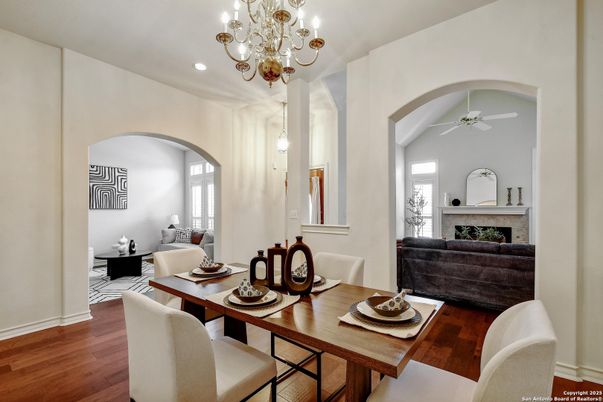 Chandelier, Dining room, Fireplace, Interior, Recessed Lighting, Wood Texture Flooring