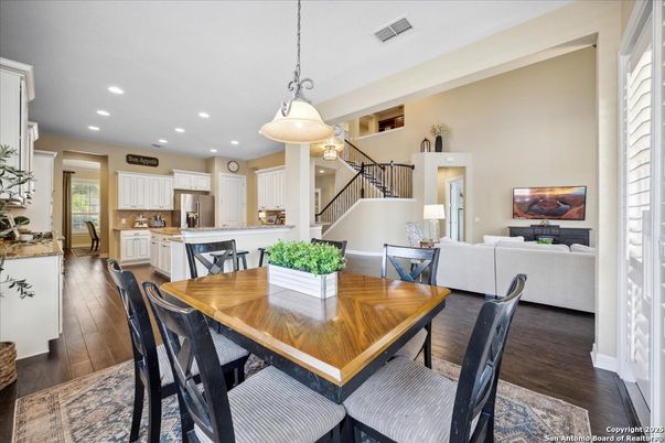 Dining room, Interior, Kitchen, Living room, Pendant Lights, Recessed Lighting, Stainless Steel Appliances, Wood Texture Flooring