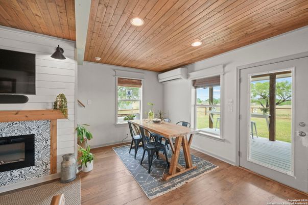 Dining room, Fireplace, Interior, Recessed Lighting, Wooden Ceilings, Wood Texture Flooring