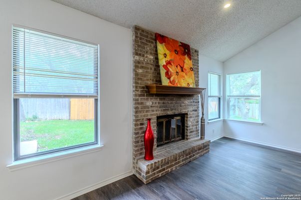 Fireplace, Interior, Recessed Lighting, Stone Walls, Wood Texture Flooring