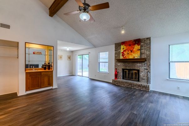 Empty room, Fireplace, Interior, Stone Walls, Wooden Beams, Wood Texture Flooring