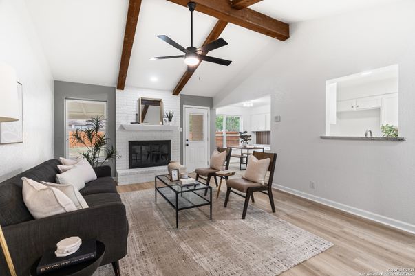 Fireplace, Interior, Living room, Recessed Lighting, Stone Walls, Wooden Beams, Wood Texture Flooring