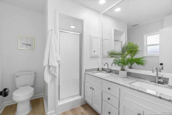 Bathroom, Dual Sink Vanities, Interior, Recessed Lighting, Wood Texture Flooring