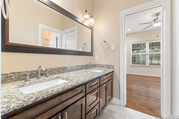 Bathroom, Dual Sink Vanities, Interior, Recessed Lighting, Wood Texture Flooring