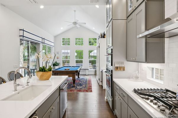 Billiard Table, Game Room, Interior, Kitchen, Recessed Lighting, Stainless Steel Appliances, Wood Texture Flooring