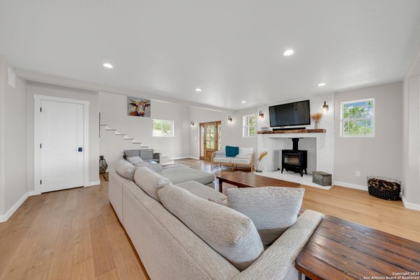 Fireplace, Interior, Living room, Recessed Lighting, Wood Texture Flooring