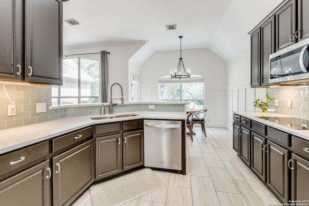 Dining room, Interior, Kitchen, Pendant Lights, Stainless Steel Appliances, Wood Texture Flooring