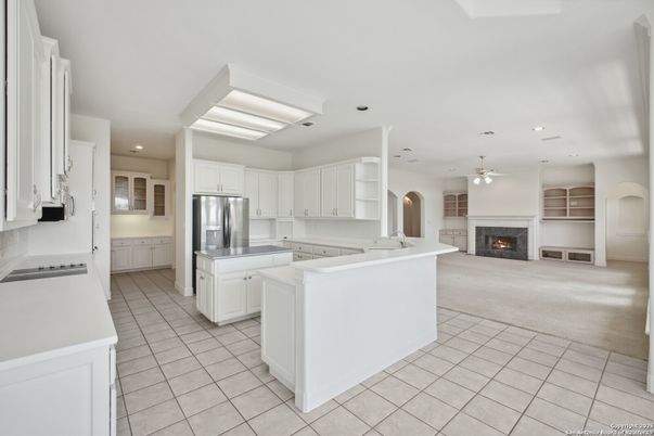 Fireplace, Interior, Kitchen, Recessed Lighting, Stainless Steel Appliances