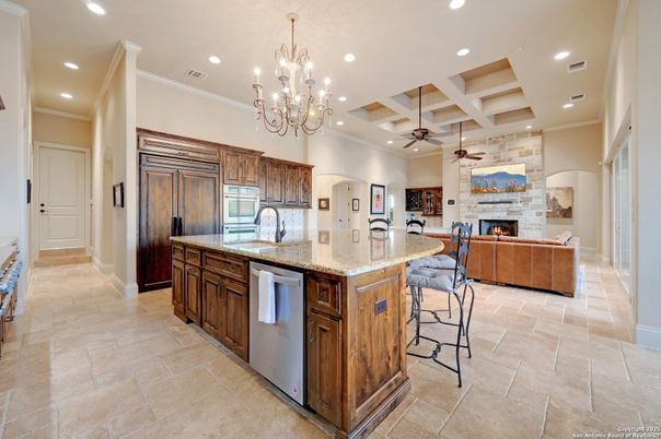 Chandelier, Fireplace, Interior, Kitchen, Living room, Recessed Lighting, Stainless Steel Appliances