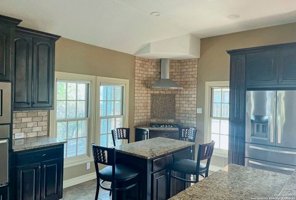 Dining room, Interior, Kitchen, Recessed Lighting, Stainless Steel Appliances, Stone Walls