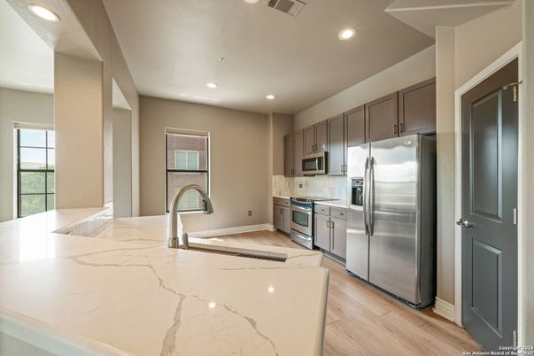 Interior, Kitchen, Recessed Lighting, Stainless Steel Appliances, Wood Texture Flooring