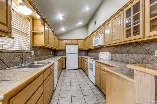 Interior, Kitchen, Recessed Lighting, Tile Countertops