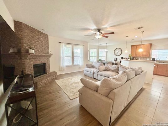 Dining room, Fireplace, Interior, Kitchen, Living room, Pendant Lights, Recessed Lighting, Stone Walls, Wood Texture Flooring