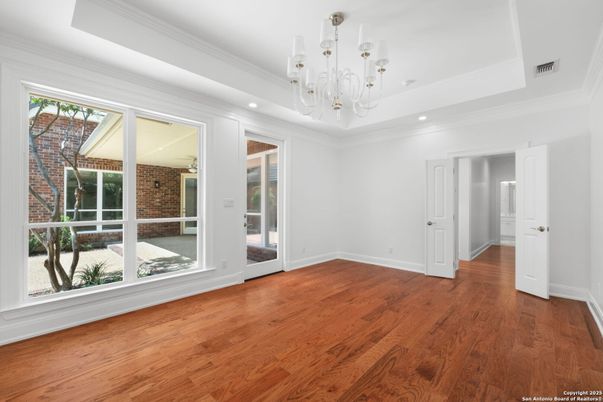 Chandelier, Empty room, Interior, Recessed Lighting, Stone Walls, Wood Texture Flooring