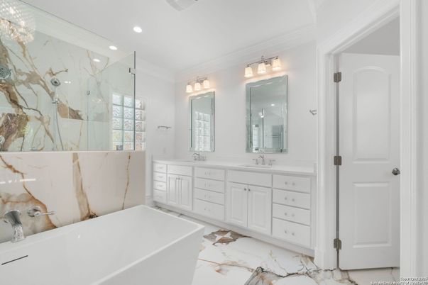 Bathroom, Dual Sink Vanities, Free Standing Baths, Glass Shower, Interior, Marble, Marble Walls, Recessed Lighting