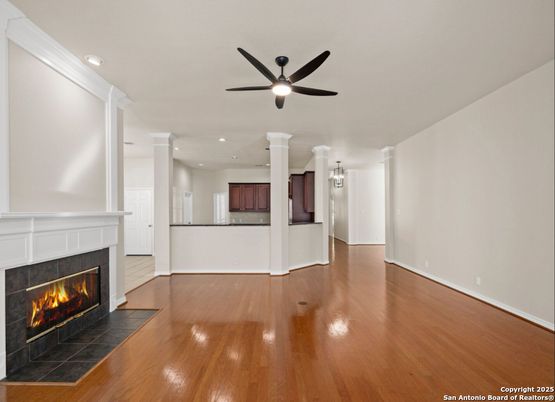 Empty room, Fireplace, Interior, Pendant Lights, Recessed Lighting, Wood Texture Flooring
