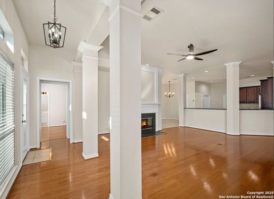Empty room, Fireplace, Interior, Pendant Lights, Recessed Lighting, Wood Texture Flooring