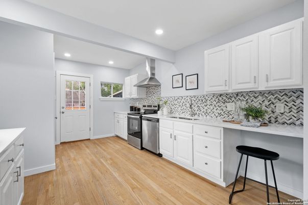 Interior, Kitchen, Recessed Lighting, Stainless Steel Appliances, Wood Texture Flooring