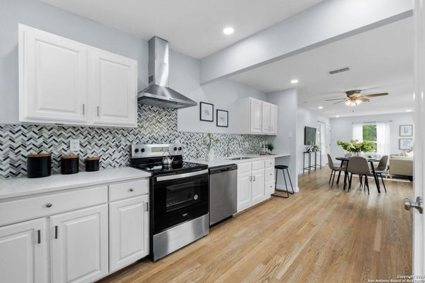 Dining room, Interior, Kitchen, Recessed Lighting, Stainless Steel Appliances, Wood Texture Flooring