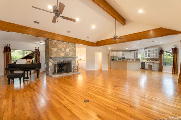 Fireplace, Interior, Kitchen, Pendant Lights, Piano, Recessed Lighting, Stone Walls, Wooden Beams, Wood Texture Flooring