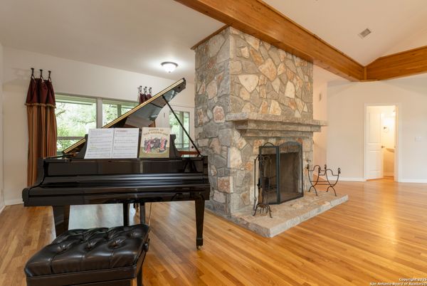 Fireplace, Interior, Piano, Stone Walls, Wood Texture Flooring