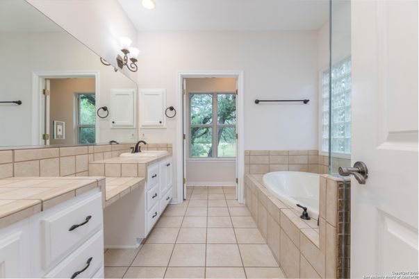 Bathroom, Dual Sink Vanities, Interior, Recessed Lighting, Tile Countertops