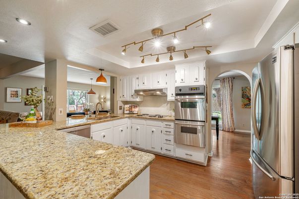 Interior, Kitchen, Pendant Lights, Recessed Lighting, Stainless Steel Appliances, Wood Texture Flooring