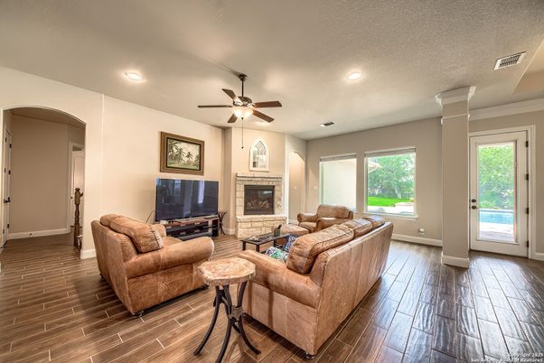 Fireplace, Interior, Living room, Recessed Lighting, Wood Texture Flooring
