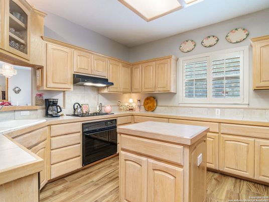 Interior, Kitchen, Tile Countertops, Wood Texture Flooring