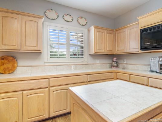 Interior, Kitchen, Tile Countertops, Wood Texture Flooring