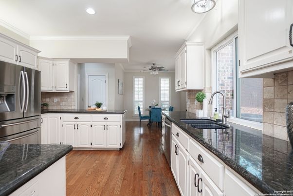 Dining room, Interior, Kitchen, Recessed Lighting, Stainless Steel Appliances, Wood Texture Flooring