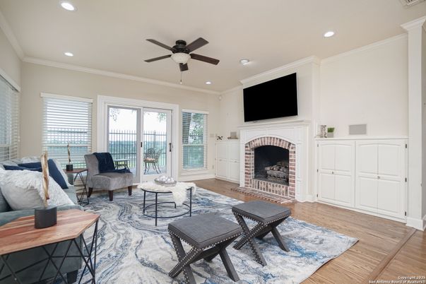 Fireplace, Interior, Living room, Recessed Lighting, Water, Wood Texture Flooring