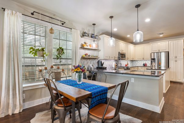 Dining room, Interior, Kitchen, Pendant Lights, Recessed Lighting, Stainless Steel Appliances, Wood Texture Flooring