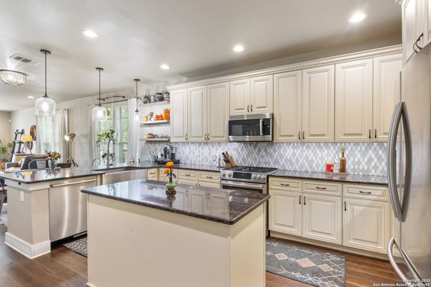 Interior, Kitchen, Pendant Lights, Recessed Lighting, Stainless Steel Appliances, Wood Texture Flooring