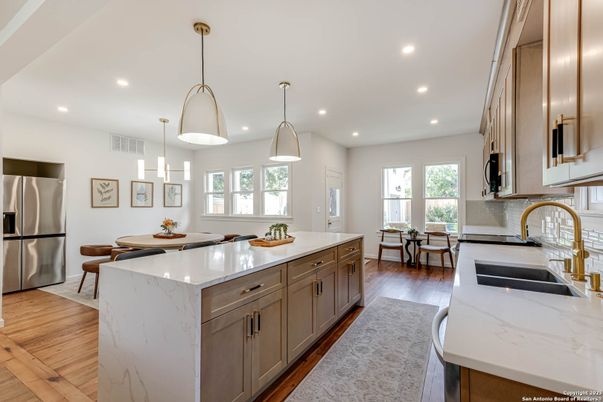 Dining room, Interior, Kitchen, Pendant Lights, Recessed Lighting, Stainless Steel Appliances, Wood Texture Flooring