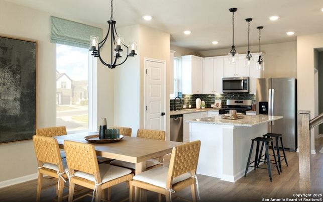 Dining room, Interior, Kitchen, Pendant Lights, Recessed Lighting, Stainless Steel Appliances, Wood Texture Flooring