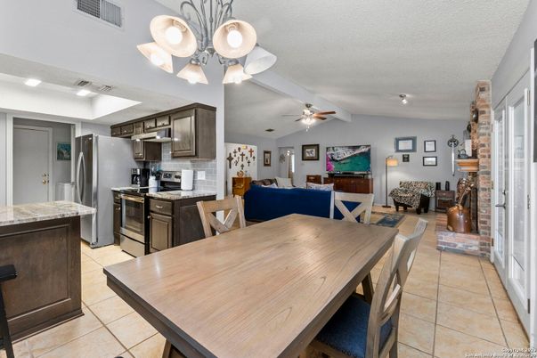 Dining room, Fireplace, Interior, Kitchen, Living room, Recessed Lighting, Stainless Steel Appliances