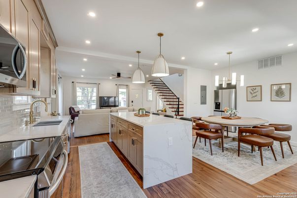 Dining room, Interior, Kitchen, Living room, Pendant Lights, Recessed Lighting, Stainless Steel Appliances, Wood Texture Flooring