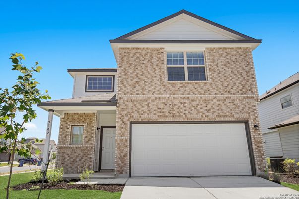 Attached, Exterior, Facade, Brick Traditional