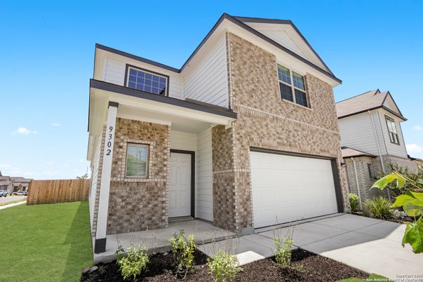 Attached, Exterior, Facade, Brick Traditional