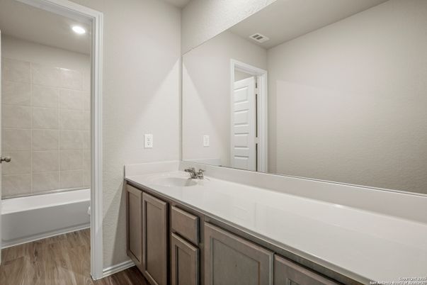 Bathroom, Dual Sink Vanities, Interior, Recessed Lighting, Wood Texture Flooring