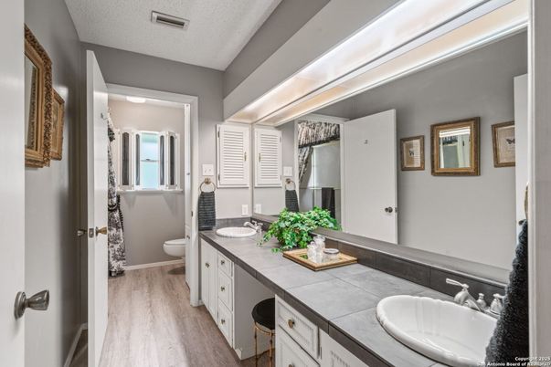 Bathroom, Dual Sink Vanities, Interior, Tile Countertops, Wood Texture Flooring